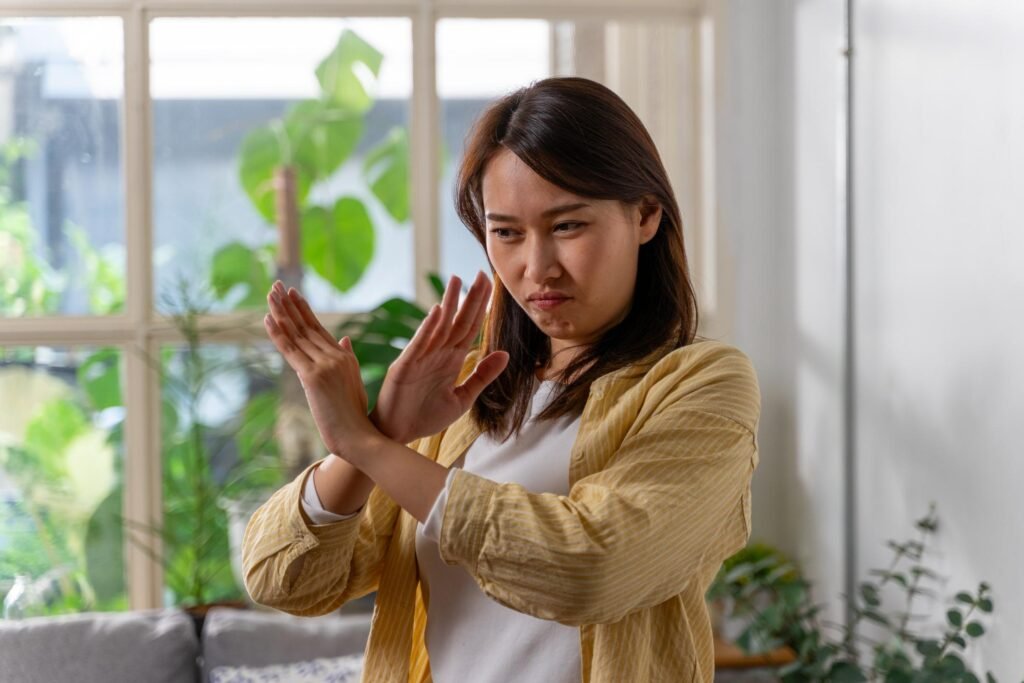 Woman learning “How to Stop Being a People Pleaser and prioritize herself