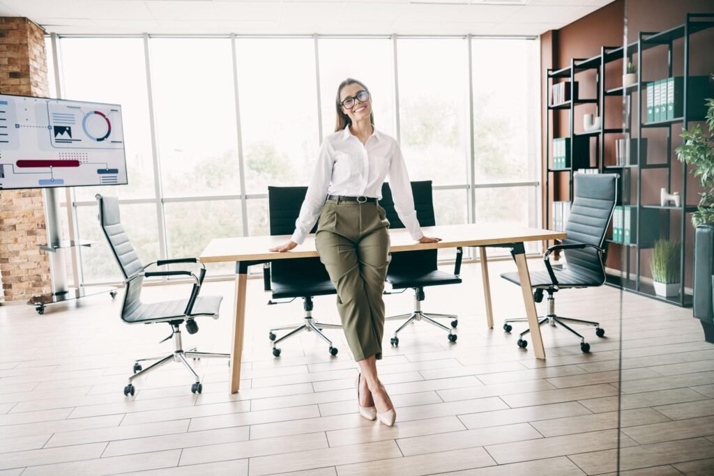 Confident woman leader demonstrating Women Leadership Skills and professional growth